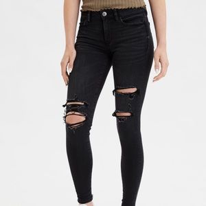 Black (faded) low rise ripped jeans